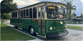 Exterior view of Green & Tan Trolley – 32 Passengers