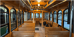 Interior view of Green & Tan Trolley – 32 Passengers