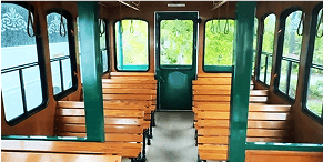 Interior view of White Classic Trolley – 28 Passengers